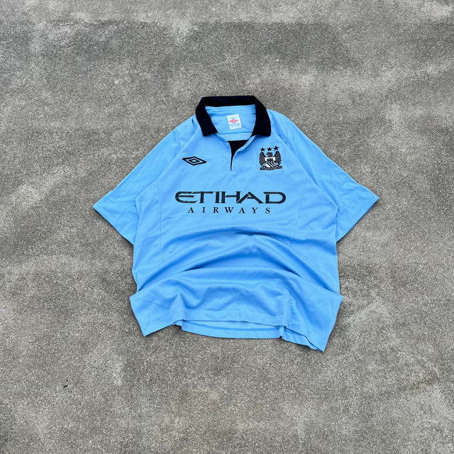 UMBRO M.C.F.C. ETHAD AIRWAYS JERSEY - LARGE